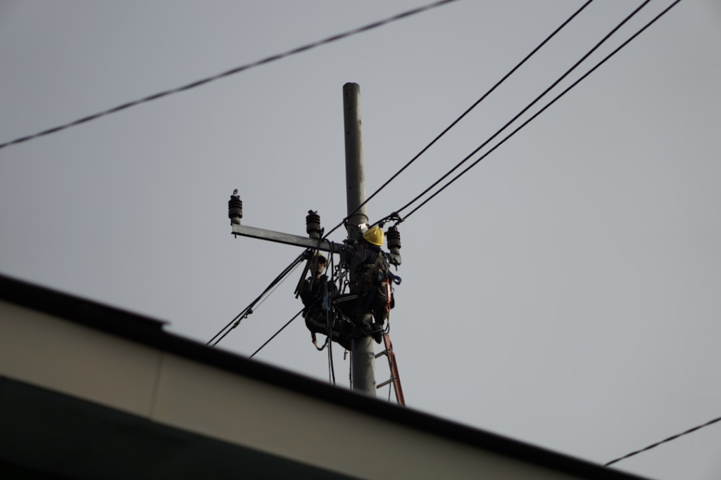 a power pole with a bunch of wires attached to it