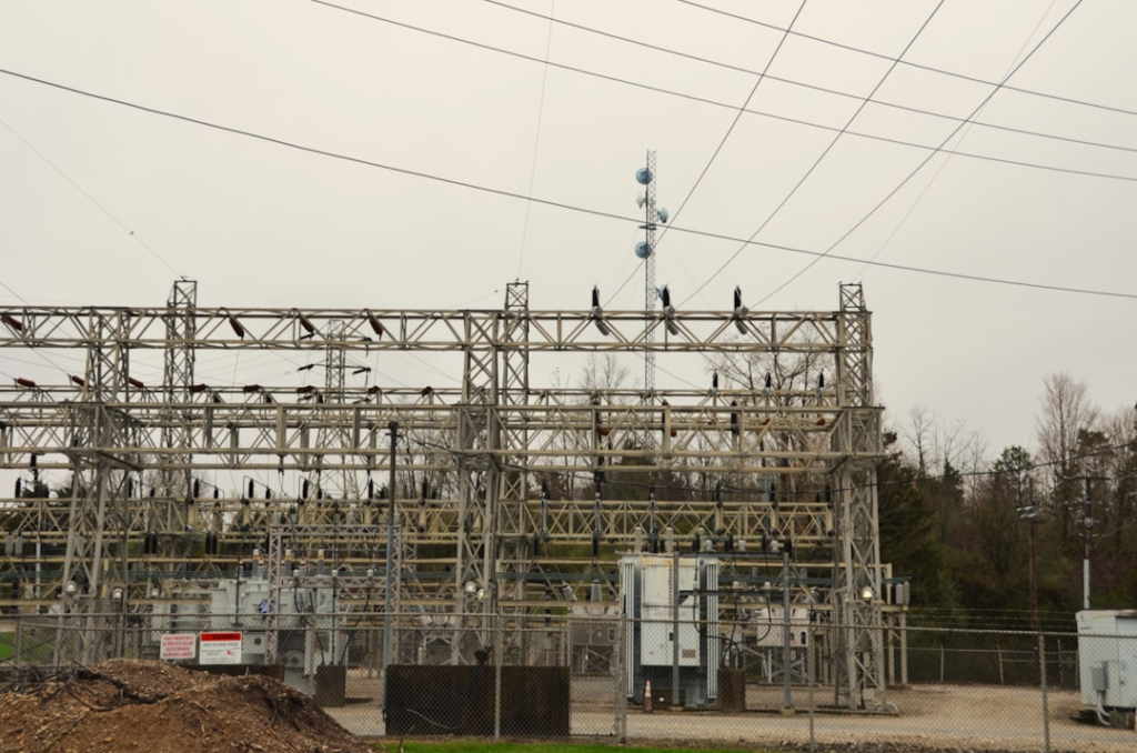 Power lines are connected to an electrical substation.